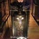 Mistress Troy observes bondage whore in leather body bag