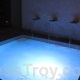 Dominatrix Mistress Troy enters the hot tub