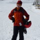 Mistress Troy needs a better ski valet to haul her gear around