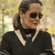 Dominatrix Mistress Troy keeps an eye on her pet in New York City